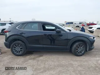2021 Mazda CX-30 2.5 S with VIN 3MVDMAAL2MM303321, listed as a IAAI auction lot 41583346 with 57,122 mi miles. Bid and sale history available at carsss.com. Image 13.