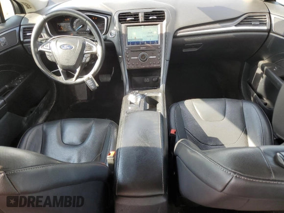 2020 Ford Fusion Titanium with VIN 3FA6P0D96LR173756, listed as a Copart auction lot 56467885 with 77,217 mi miles and Salvage title. Bid and sale history available at DreamBid. Image 8.