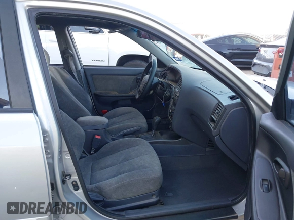 2003 Hyundai Elantra GLS z VIN KMHDN45D43U552485, wystawiony jako IAAI lot #41680449 z przebiegiem 127 899 mil mil oraz . Historia ofert i sprzedaży dostępna na DreamBid. Obrazek 5.