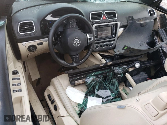 2013 Volkswagen Eos Komfort with VIN WVWBW8AH1DV006523, listed as a Copart auction lot 52037965 with 77,746 mi miles and Salvage Title. Bid and sale history available at DreamBid. Image 8.