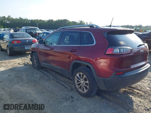 2019 Jeep Cherokee Latitude z VIN 1C4PJLCB9KD325901, wystawiony jako IAAI lot #42234702 z przebiegiem 212 784 mil mil oraz . Historia ofert i sprzedaży dostępna na DreamBid. Obrazek 3.