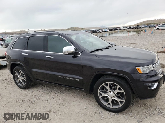 2020 Jeep Grand Cherokee Overland with VIN 1C4RJFCG9LC264711, listed as a Copart auction lot 51505885 with 52,670 mi miles and Salvage Title. Bid and sale history available at DreamBid. Image 4.