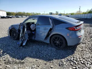 2023 Honda Civic Sport z VIN 19XFL2H85PE004313, wystawiony jako Copart lot #54268555 z przebiegiem Nie podano mil oraz Szkoda całkowita • Salvage title. Historia ofert i sprzedaży dostępna na DreamBid. Obrazek 2.