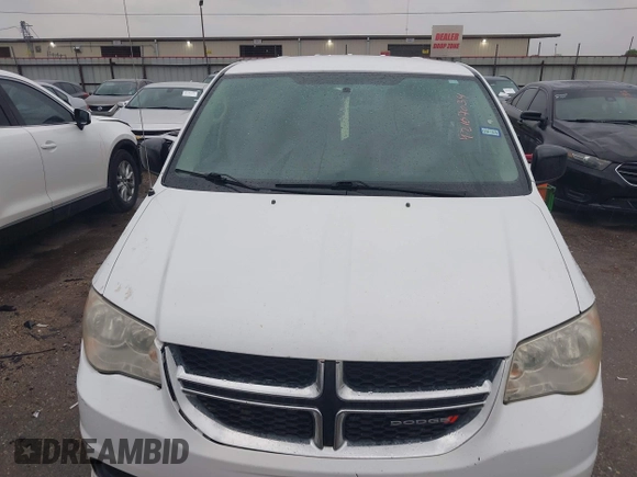 2014 Dodge Grand Caravan American Value with VIN 2C4RDGBG6ER378495, listed as a IAAI auction lot 42107034 with 167,820 mi miles and . Bid and sale history available at DreamBid. Image 6.