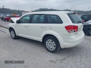 2014 Dodge Journey SE with VIN 3C4PDCAB7ET134454, listed as a IAAI auction lot 41966206 with 145,814 mi miles and . Bid and sale history available at DreamBid. Image 3.
