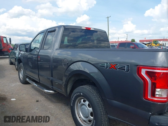 2015 Ford F-150 XLT with VIN 1FTEX1E89FKD84587, listed as a IAAI auction lot 42102545 with 141,265 mi miles. Bid and sale history available at carsss.com. Image 14.