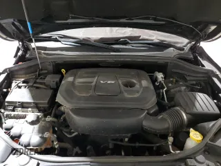 2018 Jeep Grand Cherokee Overland with VIN 1C4RJFCG1JC287784, listed as a Copart auction lot 50391255 with 105,981 mi miles and Salvage title. Bid and sale history available at DreamBid. Image 12.