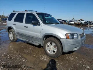 2002 Ford Escape XLT Choice with VIN 1FMYU03172KB66305, listed as a Copart auction lot 41917155 with 135,184 mi miles and Clean Title. Bid and sale history available at carsss.com. Image 4.