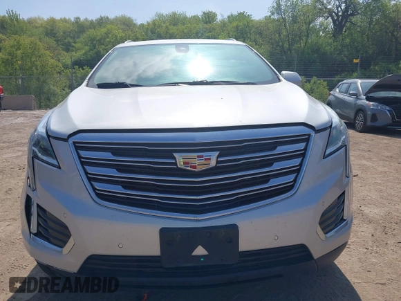 2017 Cadillac XT5 Premium Luxury AWD z VIN 1GYKNERS6HZ112170, wystawiony jako IAAI lot #42262116 z przebiegiem 140 982 mil mil oraz . Historia ofert i sprzedaży dostępna na DreamBid. Obrazek 12.