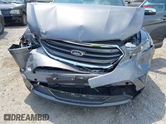 2013 Ford Taurus Limited with VIN 1FAHP2F87DG101059, listed as a IAAI auction lot 42024526 with 105,668 mi miles and . Bid and sale history available at DreamBid. Image 6.