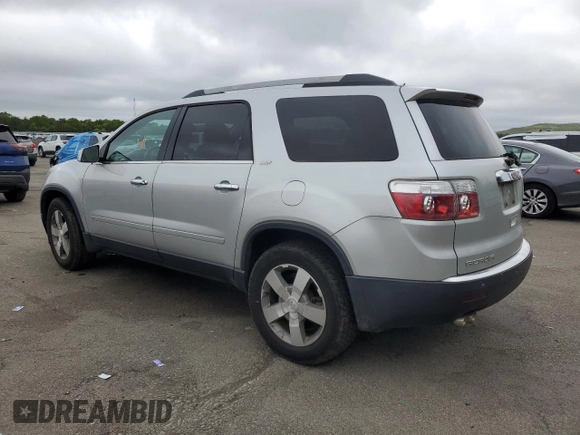 2010 GMC Acadia SLT1 z VIN 1GKLVMED8AJ135437, wystawiony jako Copart lot #59010535 z przebiegiem 101 589 mil mil oraz Czysty tytuł • Clean title. Historia ofert i sprzedaży dostępna na DreamBid. Obrazek 2.