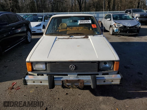 1982 Volkswagen Rabbit z VIN 1VWFB0172CV102467, wystawiony jako Copart lot #84652424 z przebiegiem 86 100 mil mil oraz Szkoda całkowita • Salvage title. Historia ofert i sprzedaży dostępna na DreamBid. Obrazek 5.