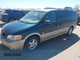1999 Pontiac Montana with VIN 1GMDX03E0XD166084, listed as a IAAI auction lot 41872976 with 196,027 mi miles and . Bid and sale history available at DreamBid. Image 2.