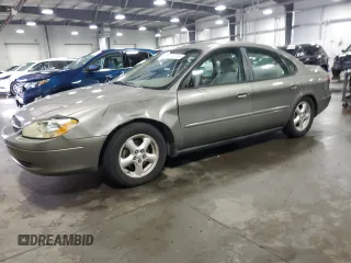 2003 Ford Taurus SE Standard with VIN 1FAFP53U43G252921, listed as a Copart auction lot 60987395 with 129,876 mi miles and Salvage title. Bid and sale history available at DreamBid. Image 1.