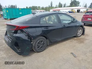2021 Toyota Prius LE z VIN JTDKAMFP0M3179016, wystawiony jako IAAI lot #42204095 z przebiegiem 34 691 mil mil oraz . Historia ofert i sprzedaży dostępna na DreamBid. Obrazek 4.