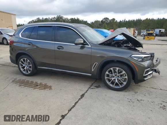 2023 BMW X5 sDrive40i with VIN 5UXCR4C07P9N73360, listed as a Copart auction lot 51128055 with Not provided miles and Salvage title. Bid and sale history available at DreamBid. Image 4.