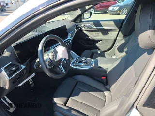 2024 BMW i4 M50 z VIN WBY33AW00RFT04066, wystawiony jako Copart lot #57458105 z przebiegiem 4754 mil mil oraz Szkody całkowita. Historia ofert i sprzedaży dostępna na DreamBid. Obrazek 7.