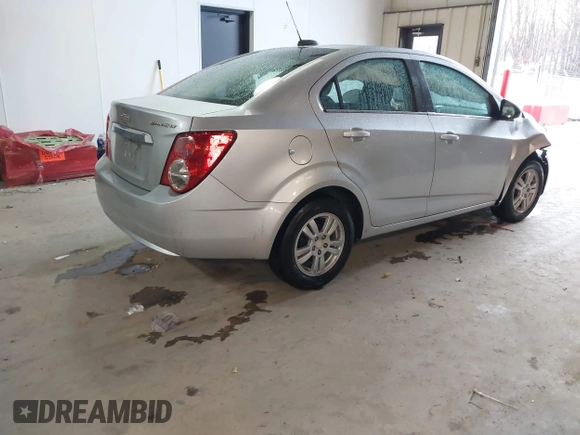 2016 Chevrolet Sonic LT z VIN 1G1JC5SH0G4138189, wystawiony jako IAAI lot #41732801 z przebiegiem 160 903 mil mil oraz . Historia ofert i sprzedaży dostępna na DreamBid. Obrazek 4.