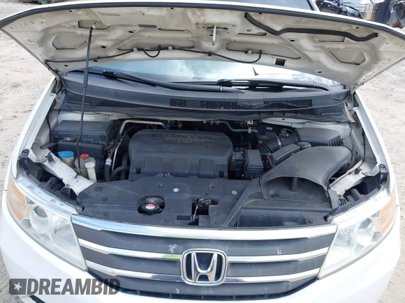 2011 Honda Odyssey EX-L with VIN 5FNRL5H67BB011070, listed as a IAAI auction lot 42491685 with 200,671 mi miles and . Bid and sale history available at DreamBid. Image 10.