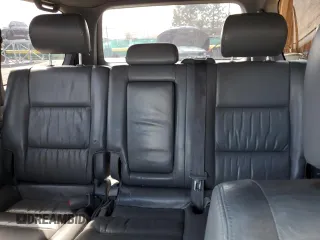 2002 Toyota Land Cruiser z VIN JTEHT05J522027452, wystawiony jako Copart lot #51141595 z przebiegiem 278 465 mil mil oraz Szkoda całkowita • Salvage title. Historia ofert i sprzedaży dostępna na DreamBid. Obrazek 10.