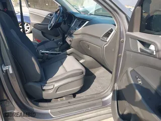 2017 Hyundai Tucson Value with VIN KM8J33A24HU281183, listed as a IAAI auction lot 41563886 with 71,110 mi miles. Bid and sale history available at carsss.com. Image 5.
