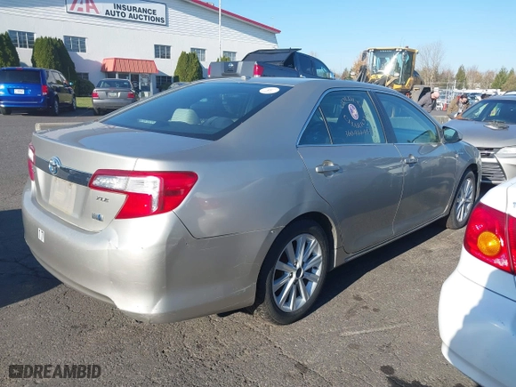 2014 Toyota Camry Hybrid LE with VIN 4T1BD1FK8EU097505, listed as a IAAI auction lot 38159878 with 379,573 mi miles. Bid and sale history available at carsss.com. Image 4.