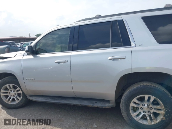 2016 Chevrolet Tahoe LS with VIN 1GNSCAEC2GR392937, listed as a IAAI auction lot 42648714 with 166,764 mi miles and . Bid and sale history available at DreamBid. Image 13.