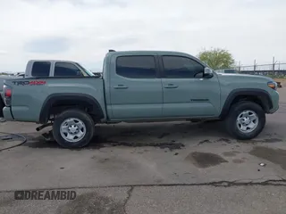 2022 Toyota Tacoma SR with VIN 3TMCZ5AN0NM507320, listed as a IAAI auction lot 42220296 with 33,342 mi miles and . Bid and sale history available at DreamBid. Image 13.