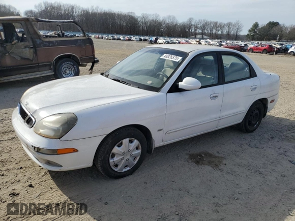 2001 Daewoo Nubira z VIN KLAJC52Z01K711120, wystawiony jako Copart lot #48926575 z przebiegiem 103 375 mil mil oraz Tytuł czysty. Historia ofert i sprzedaży dostępna na DreamBid. Obrazek 1.