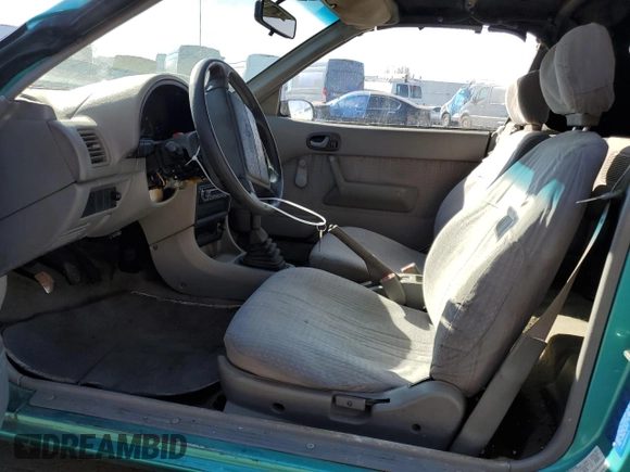 1993 Geo Metro z VIN JG1MR3367PK201491, wystawiony jako Copart lot #41543565 z przebiegiem 61 829 mil mil oraz Tytuł czysty. Historia ofert i sprzedaży dostępna na DreamBid. Obrazek 7.