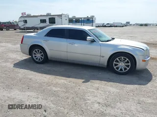2005 Chrysler 300 with VIN 2C3JA63H05H693522, listed as a IAAI auction lot 41847279 with 162,037 mi miles. Bid and sale history available at carsss.com. Image 13.