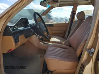 1986 Mercedes-Benz 300 300E with VIN WDBEA30D5GA296062, listed as a Copart auction lot 77434624 with 112,899 mi miles and Salvage Title. Bid and sale history available at carsss.com. Image 7.