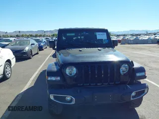 2022 Jeep Gladiator Texas Trail with VIN 1C6HJTAG7NL128584, listed as a IAAI auction lot 40630493 with Not Provided miles and . Bid and sale history available at DreamBid. Image 12.