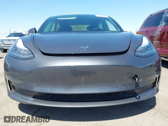 2019 Tesla Model 3 Long Range with VIN 5YJ3E1EB9KF386047, listed as a IAAI auction lot 42215362 with 41,246 mi miles and . Bid and sale history available at DreamBid. Image 13.
