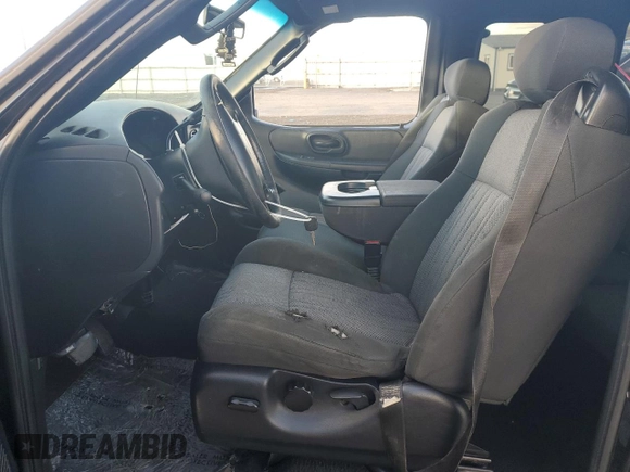 2003 Ford F-150 XL with VIN 1FTRX17L23NA98321, listed as a Copart auction lot 80576014 with 0 mi miles and Salvage Title. Bid and sale history available at carsss.com. Image 7.