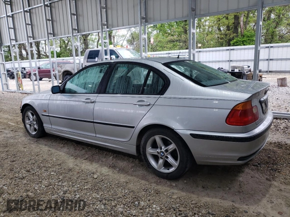 2000 BMW 3 Series 323i with VIN WBAAM3348YFP73443, listed as a Copart auction lot 54165575 with 334,761 mi miles and Salvage title. Bid and sale history available at DreamBid. Image 2.