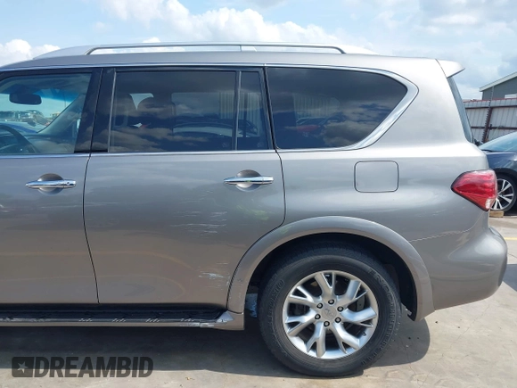 2012 Infiniti QX56 7-passenger z VIN JN8AZ2NF9C9517675, wystawiony jako IAAI lot #42138696 z przebiegiem 129 478 mil mil oraz . Historia ofert i sprzedaży dostępna na DreamBid. Obrazek 19.
