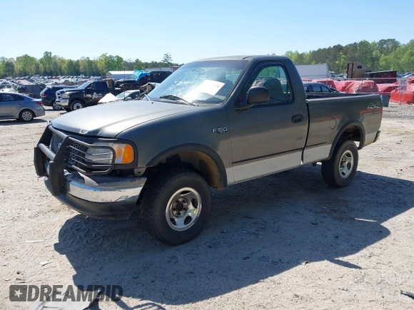 2003 Ford F-150 XL with VIN 1FTRF18243NB29920, listed as a IAAI auction lot 42037138 with 230,215 mi miles and . Bid and sale history available at DreamBid. Image 2.