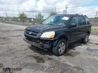 2004 Honda Pilot EX with VIN 5FNYF18514B001334, listed as a IAAI auction lot 41754663 with 208,514 mi miles. Bid and sale history available at carsss.com. Image 17.