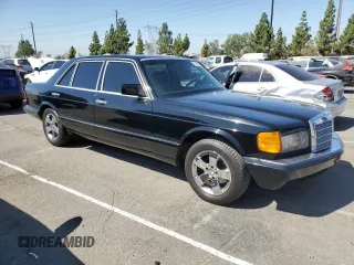 1990 Mercedes-Benz 420 with VIN WDBCA35E6LA549912, listed as a Copart auction lot 69108464 with 302,188 mi miles and Salvage Title. Bid and sale history available at carsss.com. Image 4.
