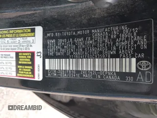 2013 Toyota Corolla L with VIN 2T1BU4EE6DC935978, listed as a IAAI auction lot 42111995 with 200,152 mi miles. Bid and sale history available at carsss.com. Image 9.