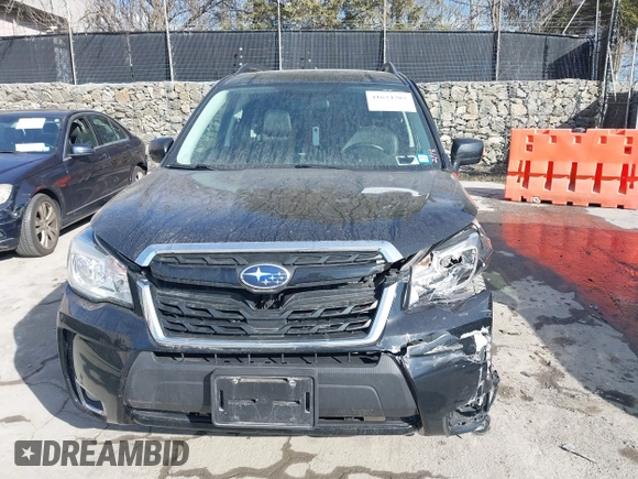 2017 Subaru Forester Premium with VIN JF2SJGEC9HH594118, listed as a IAAI auction lot 41634787 with 147,086 mi miles. Bid and sale history available at carsss.com. Image 12.