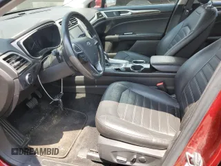 2013 Ford Fusion SE Hybrid z VIN 3FA6P0LUXDR335590, wystawiony jako Copart lot #60541395 z przebiegiem 121 975 mil mil oraz Szkoda całkowita • Salvage title. Historia ofert i sprzedaży dostępna na DreamBid. Obrazek 7.