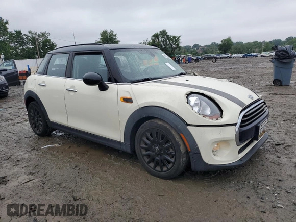 2017 MINI Hardtop 4 Door Cooper with VIN WMWXU1C53H2E18584, listed as a Copart auction lot 61355915 with 56,171 mi miles and Salvage title. Bid and sale history available at DreamBid. Image 4.