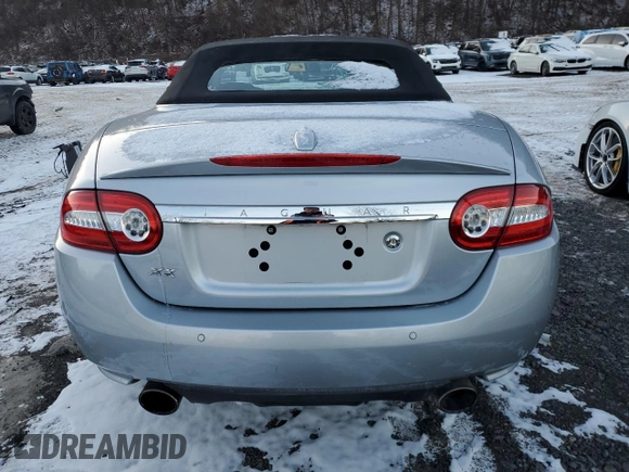 2010 Jaguar XK with VIN SAJWA4GB7ALB35518, listed as a Copart auction lot 86475814 with 32,910 mi miles and Salvage Title. Bid and sale history available at carsss.com. Image 6.