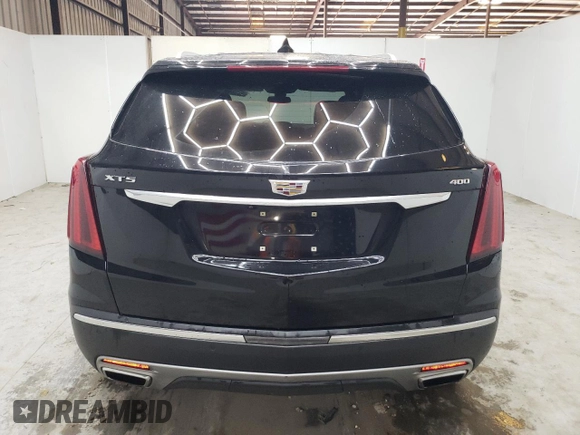 2023 Cadillac XT5 FWD Premium Luxury with VIN 1GYKNCRS6PZ171335, listed as a Copart auction lot 51859385 with 52,691 mi miles and Clean Title. Bid and sale history available at carsss.com. Image 6.