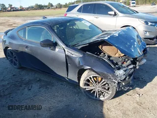2015 Scion FR-S z VIN JF1ZNAA12F8711821, wystawiony jako IAAI lot #41805146 z przebiegiem 115 796 mil mil oraz . Historia ofert i sprzedaży dostępna na DreamBid. Obrazek 1.