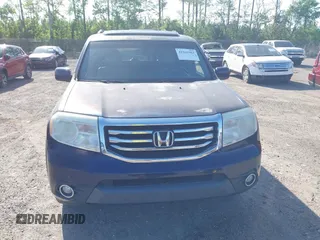 2014 Honda Pilot Touring with VIN 5FNYF4H92EB019248, listed as a IAAI auction lot 41942963 with 136,183 mi miles and . Bid and sale history available at carsss.com. Image 12.