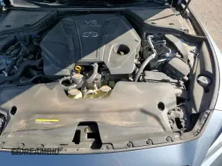 2020 Infiniti Q50 Sport z VIN JN1EV7AR5LM250430, wystawiony jako Copart lot #57112755 z przebiegiem 60 656 mil mil oraz Szkoda całkowita • Salvage title. Historia ofert i sprzedaży dostępna na DreamBid. Obrazek 16.
