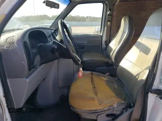 1999 Ford Econoline Cargo with VIN 1FTRE1424XHB23967, listed as a Copart auction lot 74820944 with 155,257 mi miles and Clean Title. Bid and sale history available at carsss.com. Image 7.